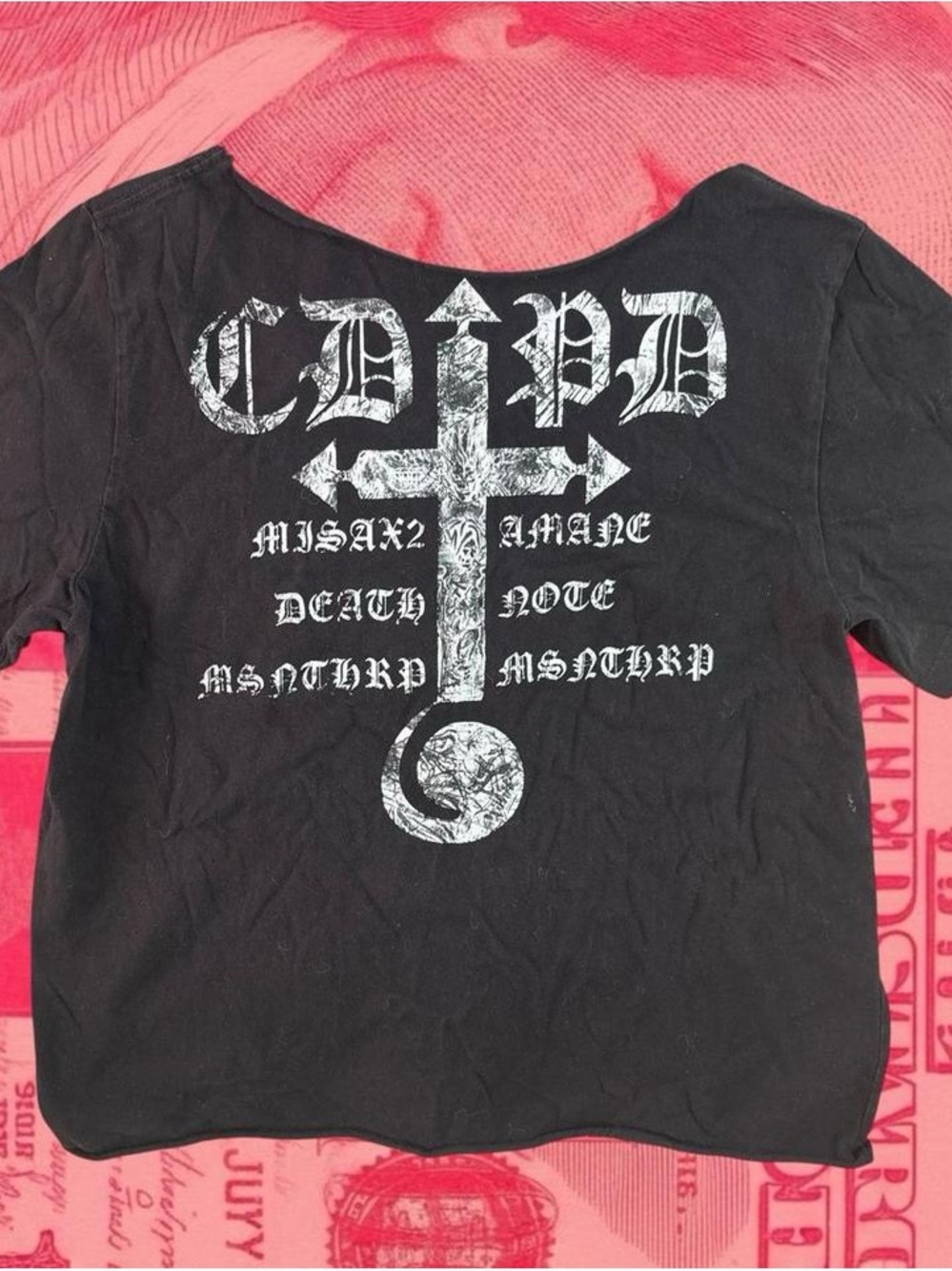 misanthropy black off shoulder cut t-shirt with white cross graphic